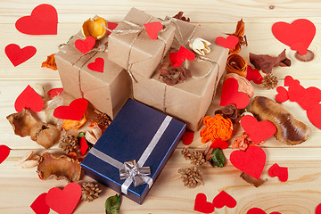 Image showing Gift boxes on wooden table