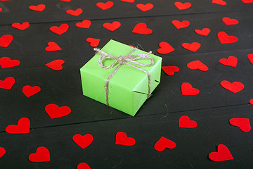 Image showing Gift boxes on wooden table