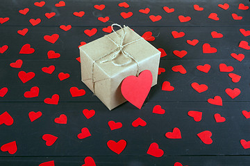 Image showing Gift boxes on wooden table