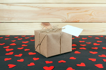 Image showing Gift boxes on wooden table