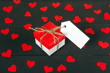 Image showing Gift boxes on wooden table