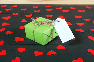 Image showing Gift boxes on wooden table