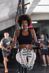 Image showing black woman doing parallel bars Exercise