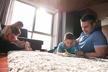 Image showing young couple spending time with kids