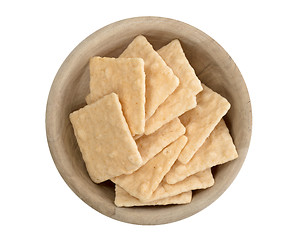 Image showing Simple crackers in a wooden bowl