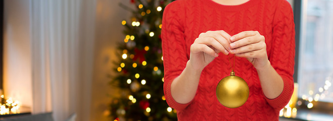 Image showing close up of woman holding christmas ball