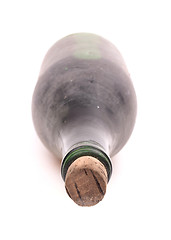 Image showing Old bottle of wine, covered in dust, selective focus