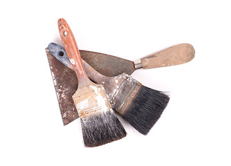Image showing Old paintbrushes with a putty knife