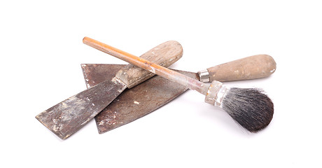 Image showing Old paintbrush with two putty knifes