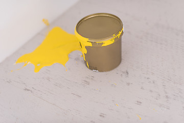 Image showing Yellow paint tin can