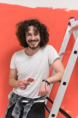 Image showing man with funny hair over color background with brush