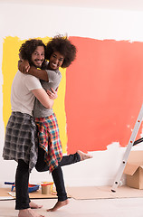 Image showing Young happy multiethnic couple hugging