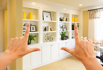 Image showing Hands Framing Custom Built-in Shelves and Cabinets Wall Design I