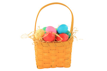 Image showing Easter dyed eggs in wooden square shaped basket 