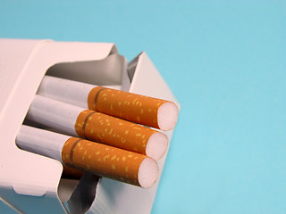 Image showing Cigarettes over blue background.