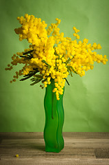 Image showing Spring bouquet with mimosa and tulips in a vase