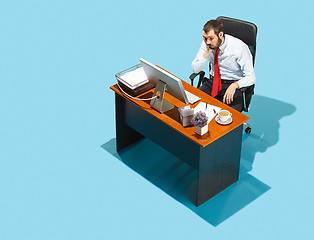 Image showing Shot from above of a stylish business man working on a laptop.