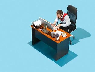 Image showing Shot from above of a stylish business man working on a laptop.