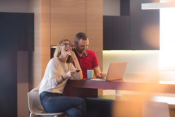 Image showing happy young couple buying online