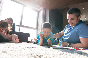 Image showing young couple spending time with kids