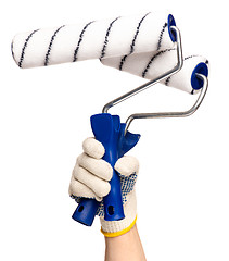 Image showing Hand with glove and paint roller