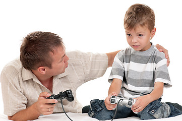 Image showing Dad and son playing with Joystick