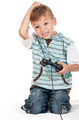 Image showing Boy playing with Joystick