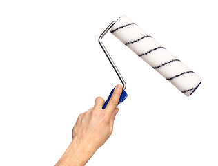 Image showing Hand with paint roller