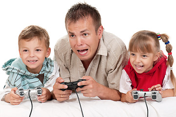 Image showing Dad and child playing with Joystick