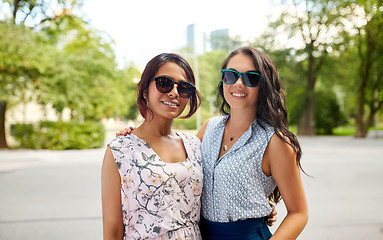 Image showing portrait of happy women or friends at summer park