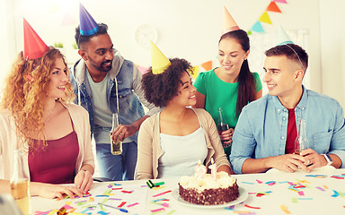 Image showing team greeting colleague at office birthday party