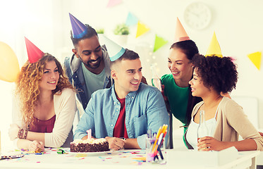 Image showing corporate team celebrating one year anniversary