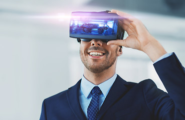 Image showing businessman with virtual reality headset at office