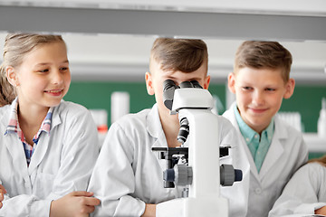 Image showing kids or students with microscope biology at school