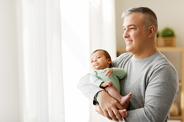 Image showing happy father holding with little baby son at home