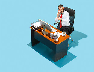 Image showing Shot from above of a stylish business man working on a laptop.