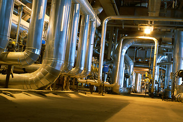 Image showing Pipes, tubes, machinery and steam turbine at a power plant