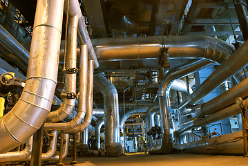 Image showing Pipes, tubes, machinery and steam turbine at a power plant