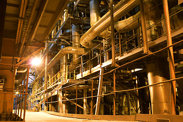 Image showing Pipes, tubes, machinery and steam turbine at a power plant