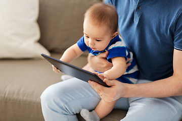 Image showing baby and father with tablet pc at home