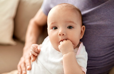 Image showing close up of father with little baby girl at home