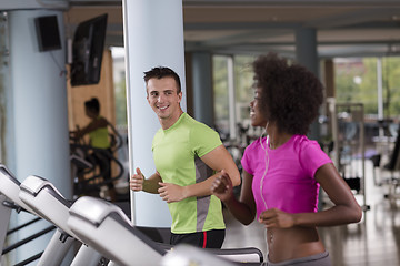 Image showing people exercisinng a cardio on treadmill