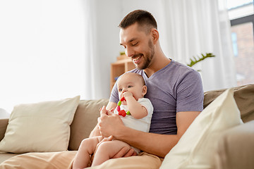 Image showing happy father with little baby daughter at home