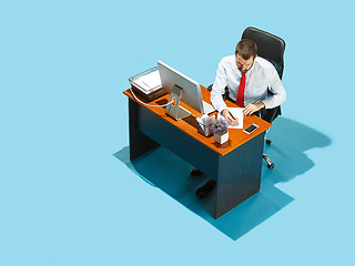 Image showing Shot from above of a stylish business man working on a laptop.