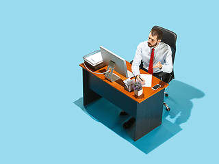 Image showing Shot from above of a stylish business man working on a laptop.