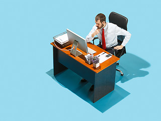 Image showing Shot from above of a stylish business man working on a laptop.