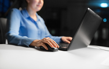 Image showing close up of businesswoman using computer mouse