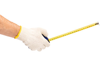 Image showing Hand with glove and tape measure