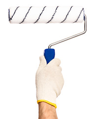 Image showing Hand with glove and paint roller