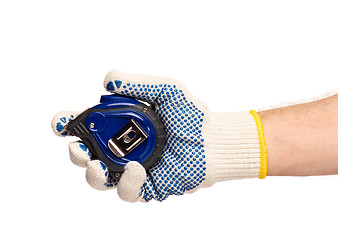 Image showing Hand with glove and tape measure